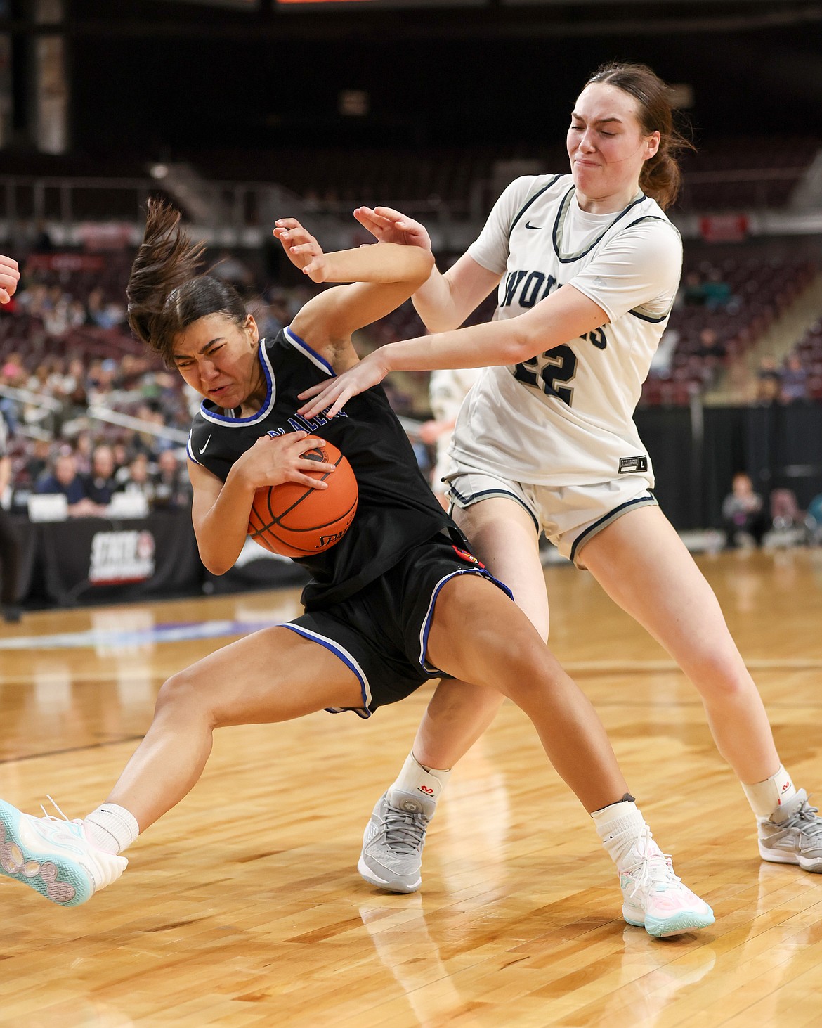 JASON DUCHOW PHOTOGRAPHY
Coeur d'Alene freshman Brookeslee Colvin protects the ball from Lake City junior Sadie Zimmerman in the state 5A girls basketball championship game Saturday night at the Ford Idaho Center in Nampa.