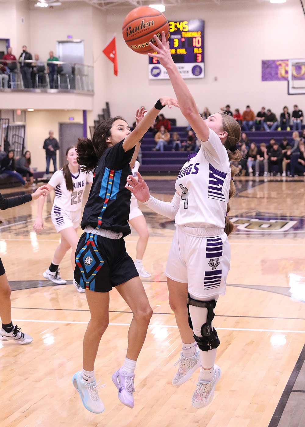 Charlo's Sheadon Kain executes a lay-up in the semi-final game against Two Eagle River during the Class C District Tournament in Polson. (Bob Gunderson)