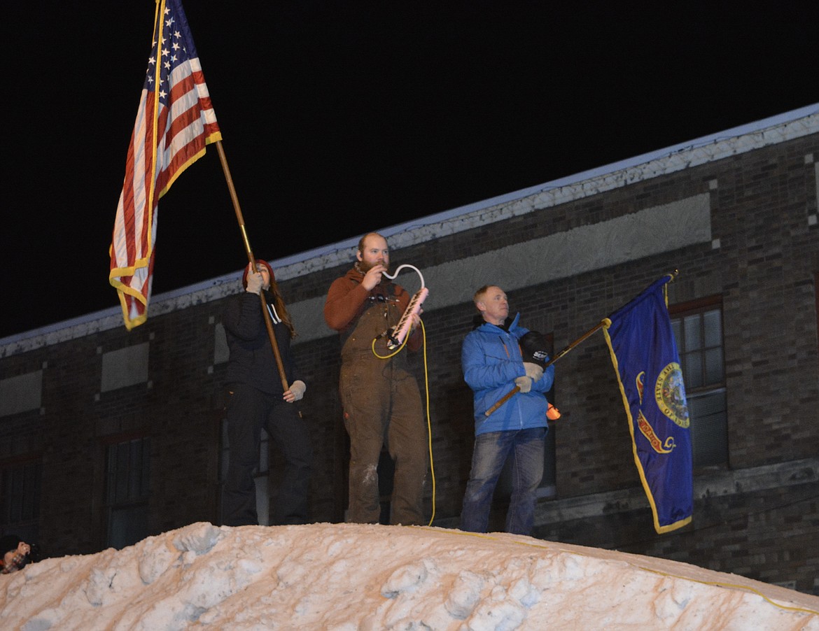 Johnny McGee performs the national anthem on top of the SkiJor hill during the opening ceremonies.