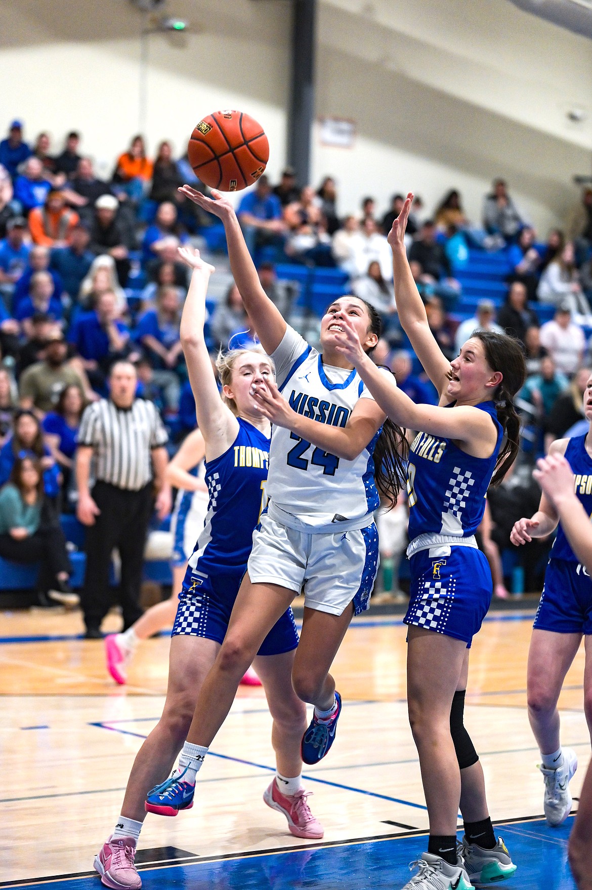 Mission's Ellannah Flat Lip goes up for two points during the Western 7B championship game against St. Regis last Saturday. (Christa Umphrey photo)