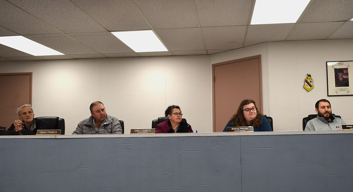 Council members, from left to right, Byron Starkey, Omar Pruneda, Emily Campos, Brittney Pittman and Jesus Martinez listen to representatives of city engineering firm Gray and Osborne during the regular Feb. 13 meeting.