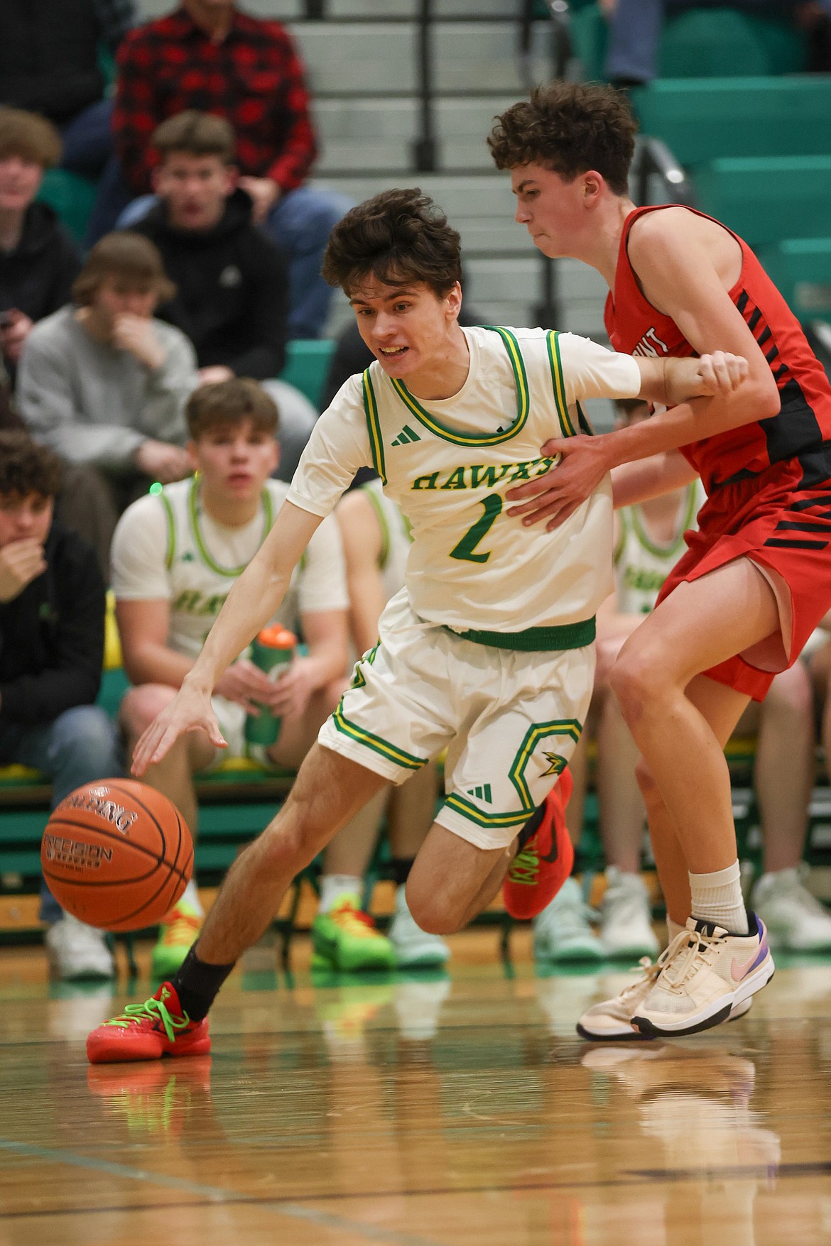 JASON DUCHOW PHOTOGRAPHY
Lakeland senior Tyler Norce drives to the basket against Sandpoint in a first-round game of the 4A Region 1 boys basketball tournament Monday night at Hawk Court in Rathdrum.