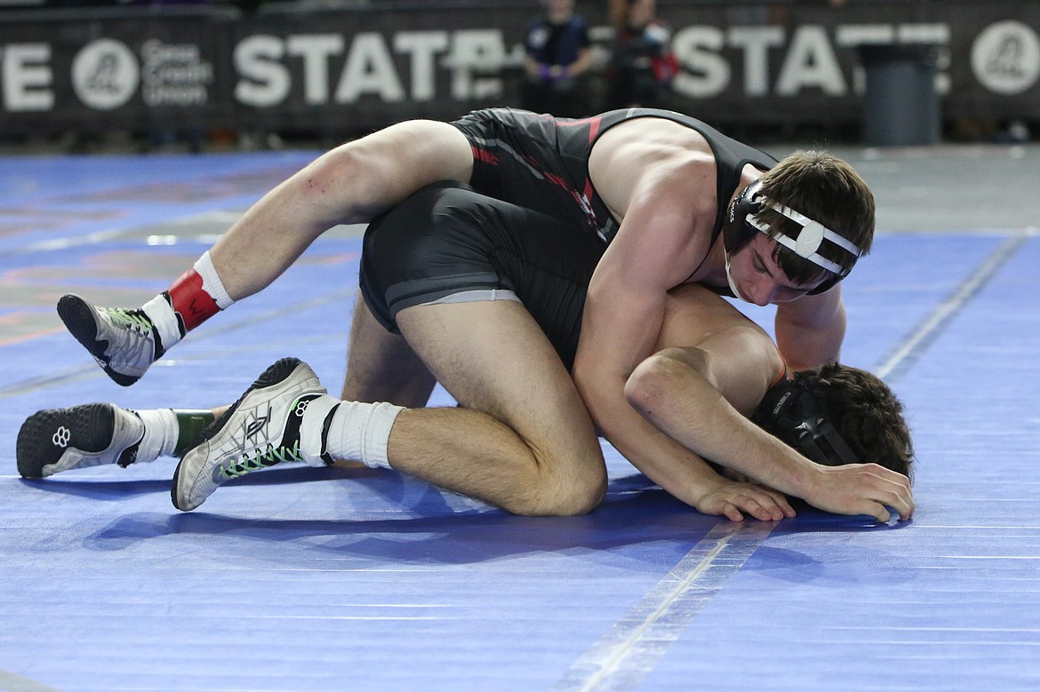 Almira/Coulee-Hartline senior Everett Wood, top, placed fourth in the 1B/2B Boys 157-pound class.