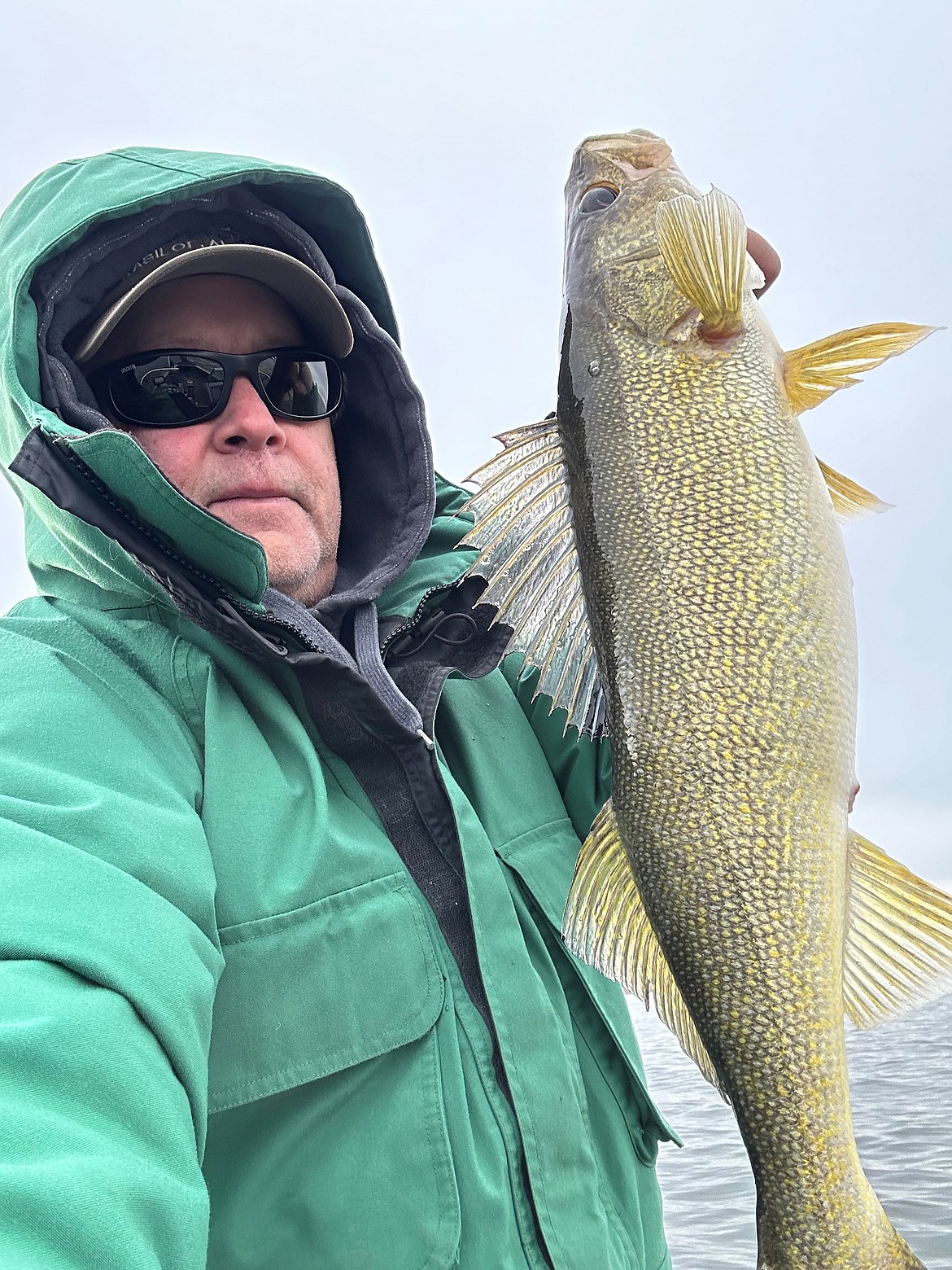 Local angler Bob McHenry shows a nice February walleye caught while jigging on Potholes Reservoir.