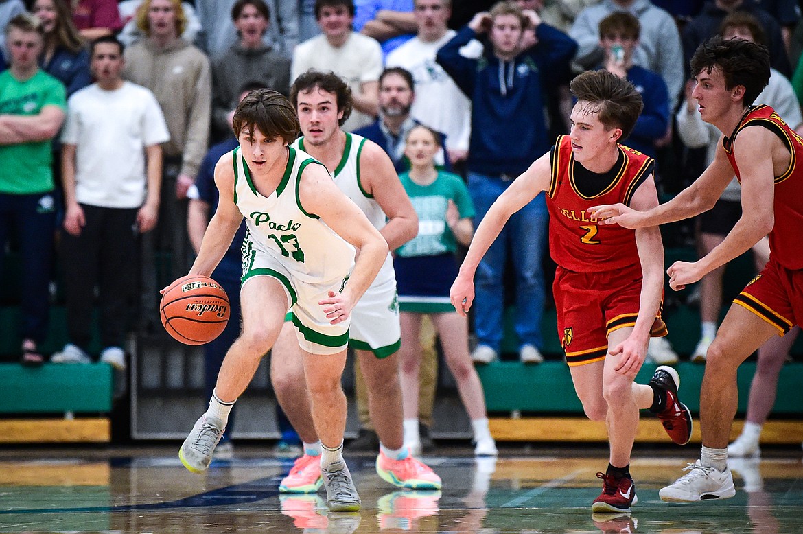 Glacier's Joshua Eagleton (13) picks up a steal in the first half against Missoula Hellgate at Glacier High School on Tuesday, Feb. 20. (Casey Kreider/Daily Inter Lake)