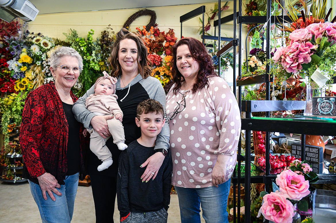 From left, Fay Wolf, Taylor Kiger holding Harper, Noah Kiger and Penny Kiger at Woodland Floral in Kalispell on Tuesday, Feb. 20. (Casey Kreider/Daily Inter Lake)