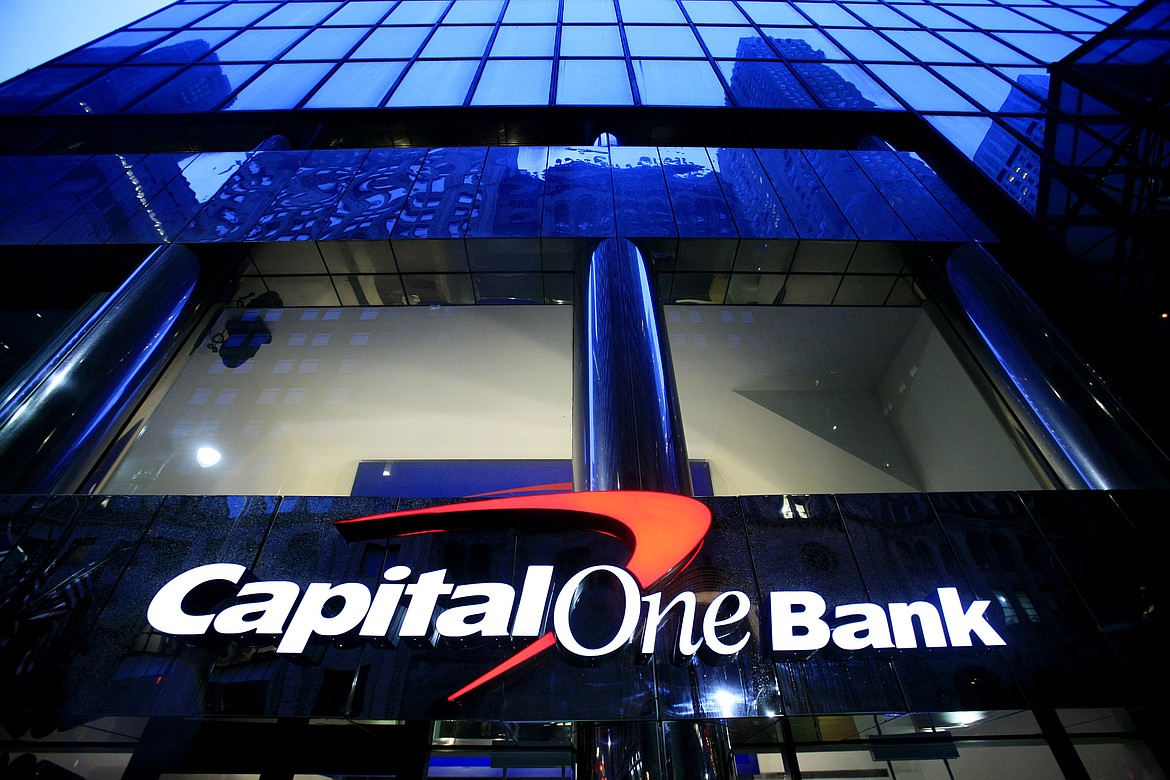 A branch office of Capital One Bank is pictured on May 7, 2009, in New York. Capital One Financial is buying Discover Financial Services for $35 billion, in a deal that would bring together two of the nation's biggest lenders and credit card issuers, according to a news release issued by the companies Monday, Feb. 19, 2024. (AP Photo/Mark Lennihan, File)