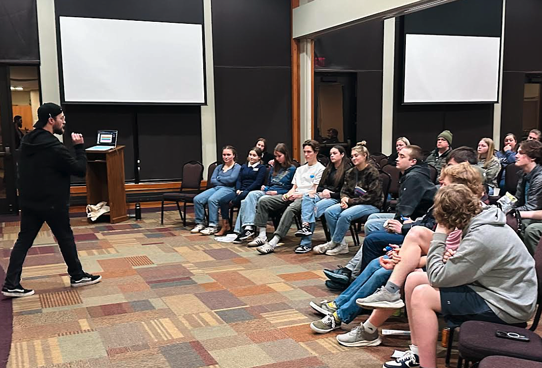 Kroc Center licensed therapist Tyson Durbin, left, shares insights and experience regarding mental health Thursday during the Interact Club of Coeur d'Alene's Coping with Creativity event at the Kroc Center.