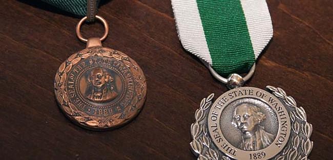 The Washington Medal of Merit, left, and Medal of Valor will be awarded for the first time in nine years.