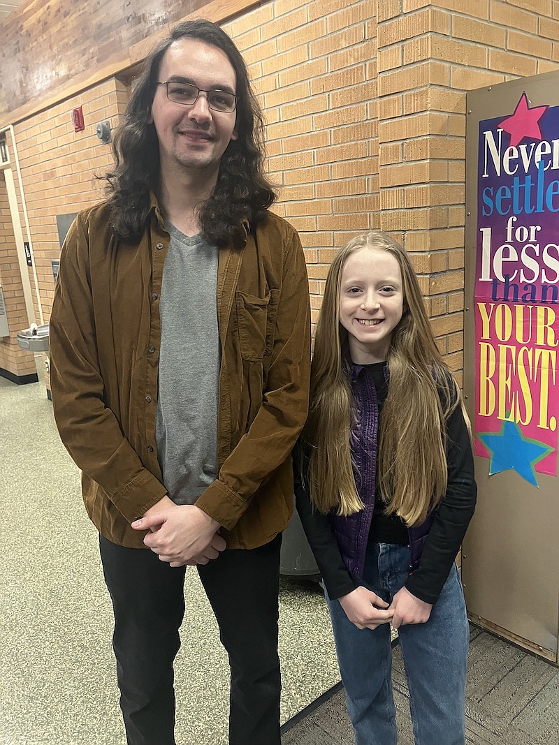 Libby Elementary School teacher Mr. Brittain and sixth-grade student Margaret Smith Salter share their excitement for her win in the spelling bee. (Photo courtesy Brittany Katzer)