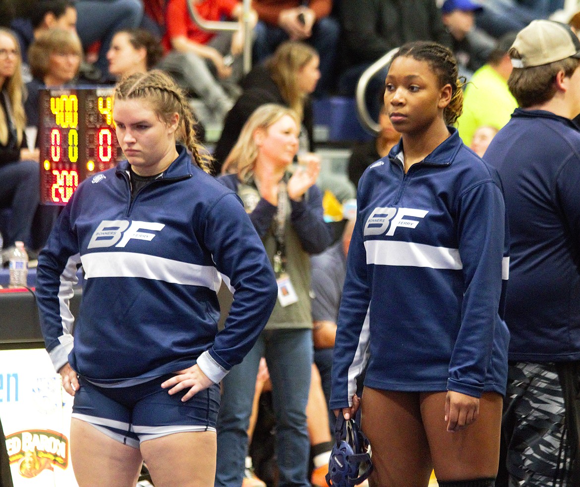 (left) Hallie Hartman and Eva Willis stared down their opponents at the championship face off.