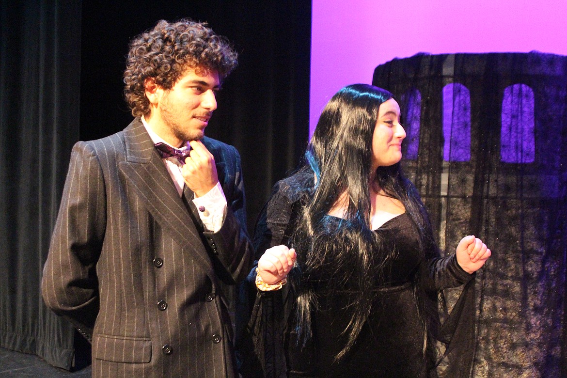 Gomez and Morticia Addams (Alexis Birrueta Ramos and Alicia Lasley Pineda) make small talk with the parents of Wednesday’s fiancé in the Quincy High School production of “The Addams Family,” opening March 1.