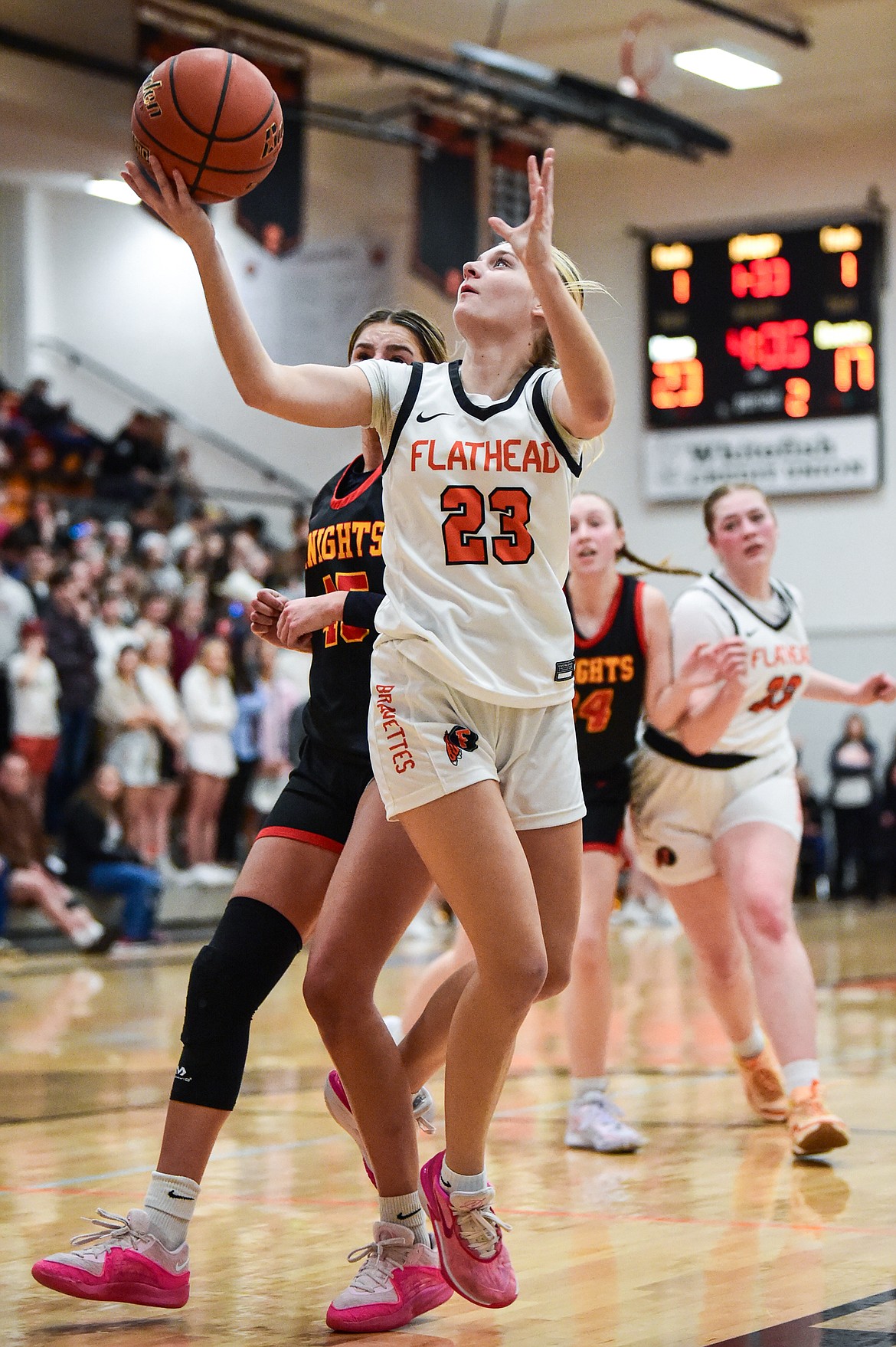 Flathead's Celie Vandenbosch (23) drives to the basket in the first half against Missoula Hellgate at Flathead High School on Thursday, Feb. 22. (Casey Kreider/Daily Inter Lake)