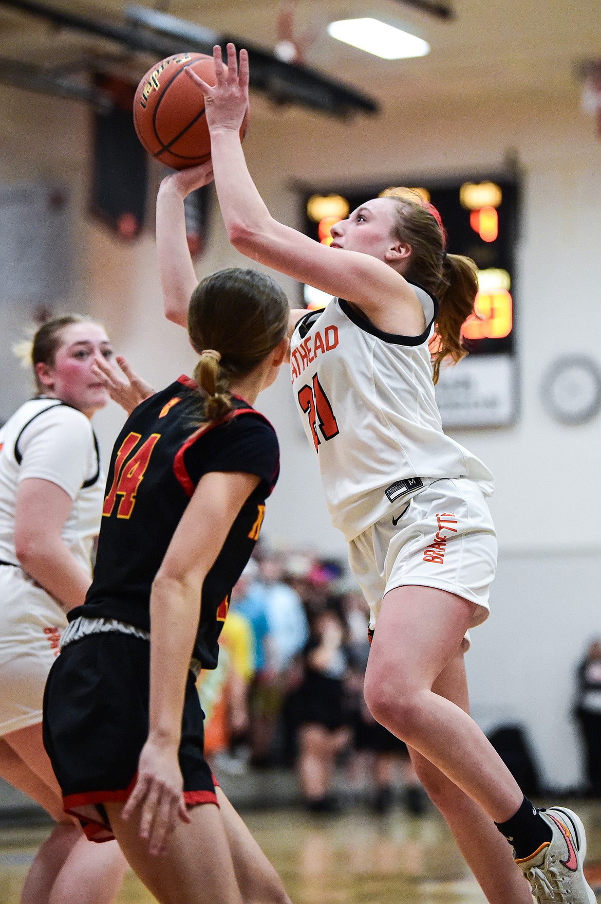 Flathead's Harlie Roth (21) drives to the basket in the first half against Missoula Hellgate at Flathead High School on Thursday, Feb. 22. (Casey Kreider/Daily Inter Lake)