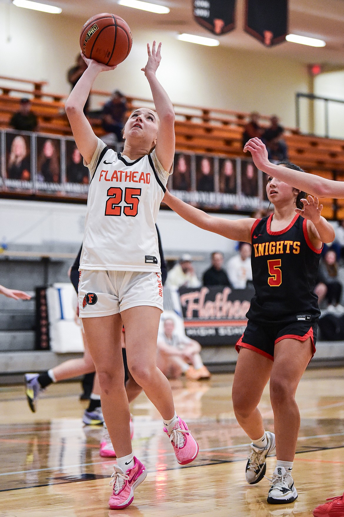 Flathead's Chloe Converse (25) drives to the basket in the second half against Missoula Hellgate at Flathead High School on Thursday, Feb. 22. (Casey Kreider/Daily Inter Lake)