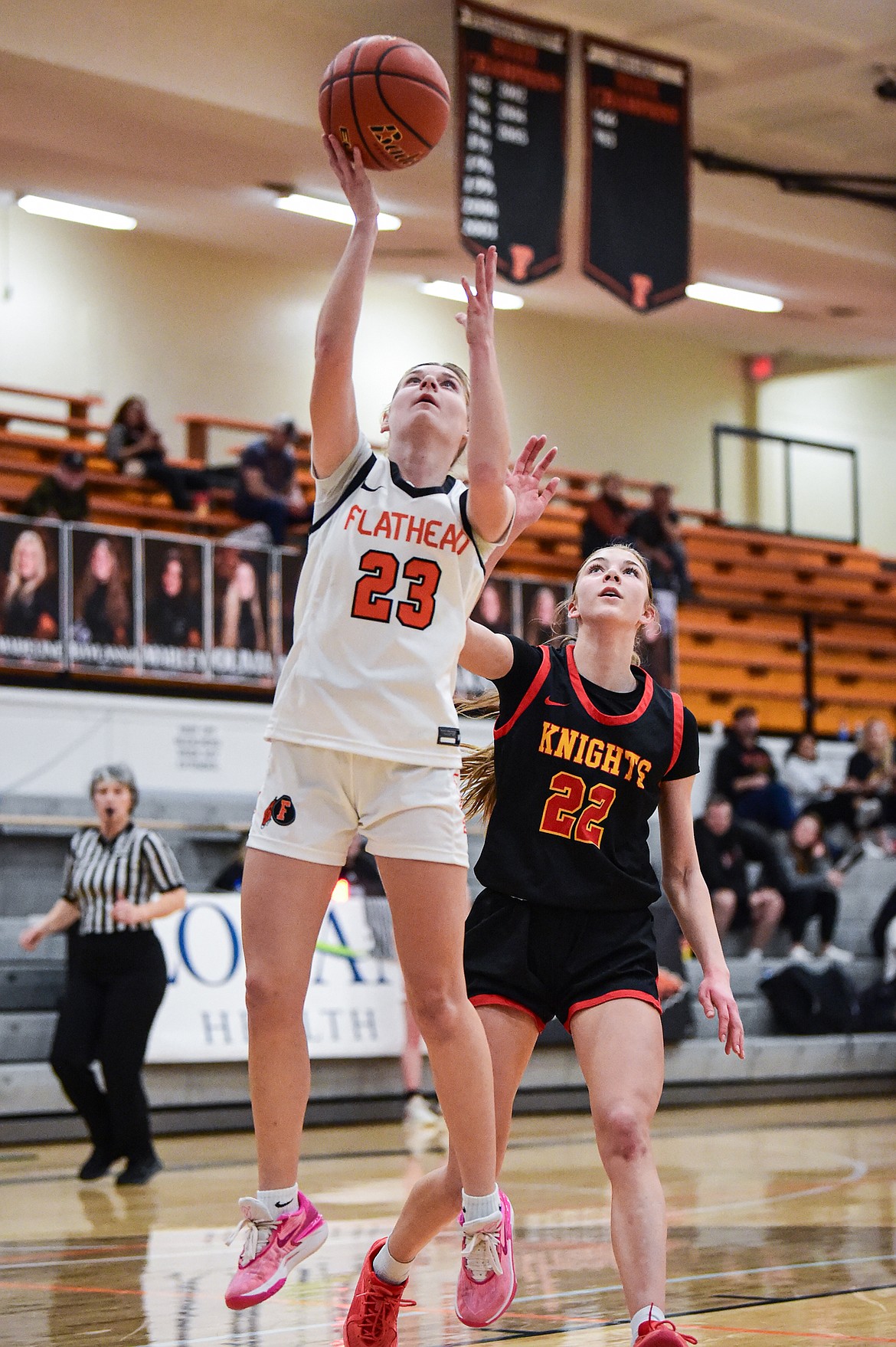 Flathead's Celie Vandenbosch (23) drives to the basket in the second half against Missoula Hellgate at Flathead High School on Thursday, Feb. 22. (Casey Kreider/Daily Inter Lake)