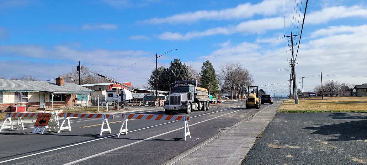 Equipment sits on Division Street just behind Columbia Ridge Elementary School on Thursday. City staff identified a section of sewer pipe that needed to be replaced despite a fairly recent repair.