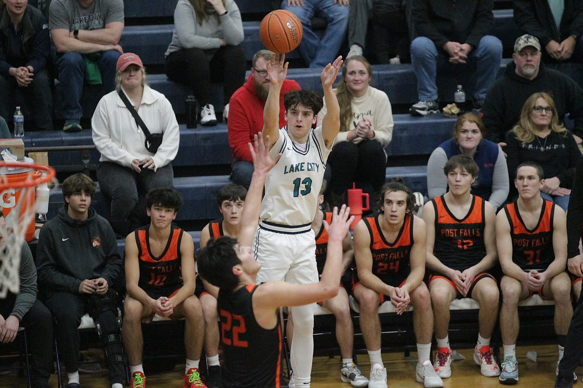 MARK NELKE/Press
Lake City senior Braydn Arrieta launches a 3-pointer against Post Falls in the first half of the 5A Region 1 second-place game Thursday at Lake City.