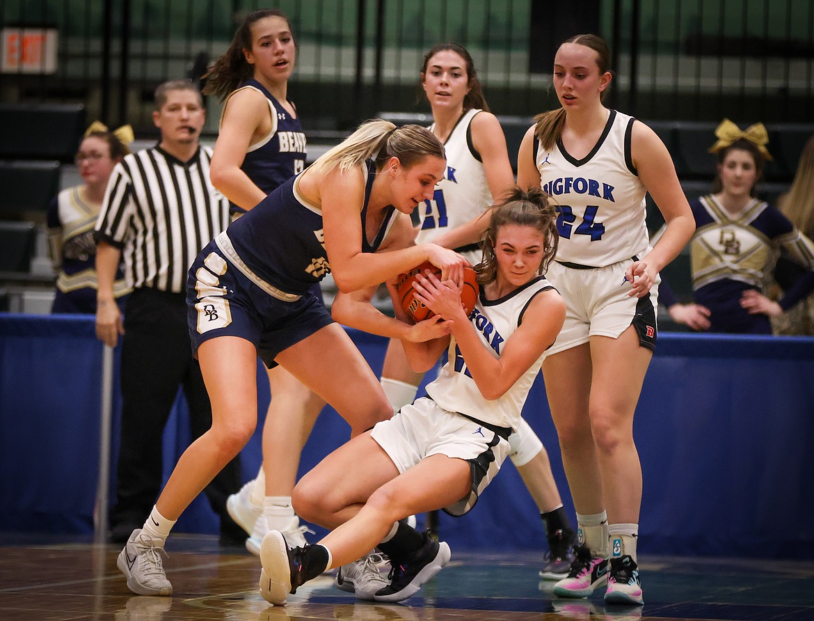 BIGFORK'S PAETEN GUNLOCK takes the ball from Dillon’s Kenleigh Graham in the third quarter of the Valkyries 61-36 win in the Western A Divisional semifinal at the Butte Civic Center Friday, Feb. 23, 2024.