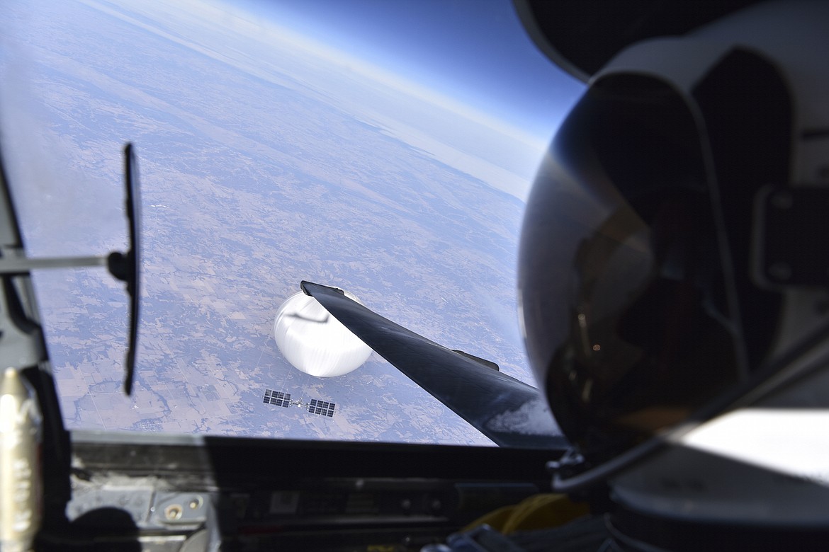 In this image provided by the Department of Defense, Wednesday, Feb. 22, 2023, a U.S. Air Force U-2 pilot looks down at a suspected Chinese surveillance balloon as it hovers over the United States on Feb. 3, 2023. A small and nonthreatening balloon spotted flying high over the mountainous Western United States was intercepted by fighter jets over Utah, Friday, Feb. 23, 2024, according to the North American Aerospace Defense Command. (Department of Defense via AP, File)