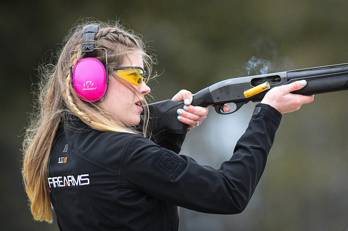 Jubilee McLean, of the Clay Commanders, fires at a clay during a round of doubles in the Pheasants Forever Youth Shooting League at the Flathead Valley Target Club on Saturday, Feb. 24. (Casey Kreider/Daily Inter Lake)