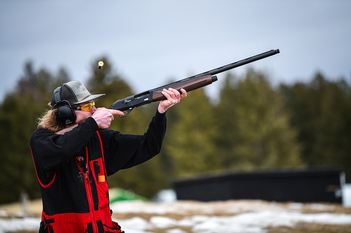 Michael Marrinan, of the Wad Squad, fires at a clay during a round of teal targets in the Pheasants Forever Youth Shooting League at the Flathead Valley Target Club on Saturday, Feb. 24. (Casey Kreider/Daily Inter Lake)