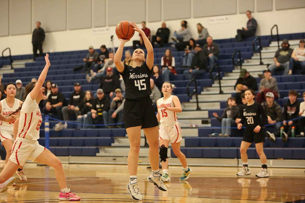 Almira/Coulee-Hartline sophomore Peyton Roberts (45) shoots the ball in the fourth quarter.