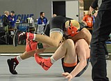 STATE WRESTLING TOURNAMENTS: Riding high again ... Seguine rallies for third straight 5A title as Trojans, with three champions, finish second in 5A