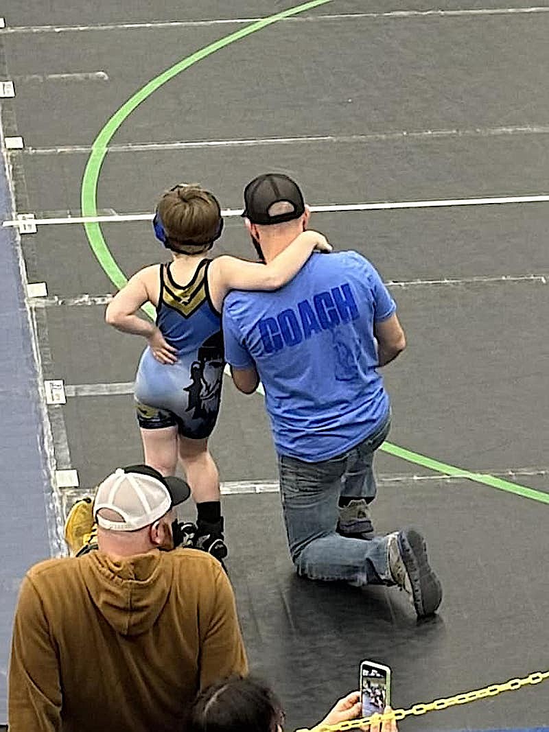 A show of solidarity at the Making a Difference tournament in Kalispell. (Photo courtesy Greenchain Wrestling Club parents)