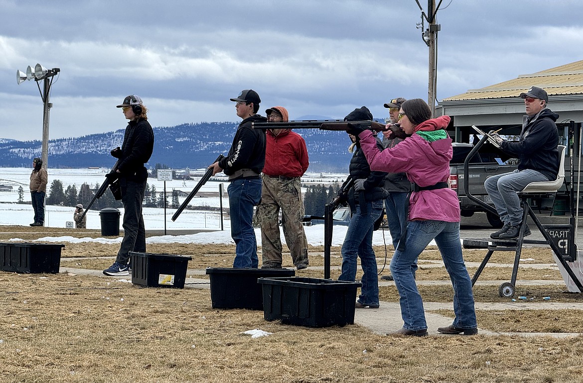 Abbi Townsend of Kalispell leans into her shooting stance during a round of doubles trap with her team, the Lady Bird Busters, at the Flathead Valley Target Club on Saturday, Feb. 24, 2024. Townsend is one of the Pheasants Forever Youth Shotgun League's top shooters. (Hilary Matheson/Daily Inter Lake)