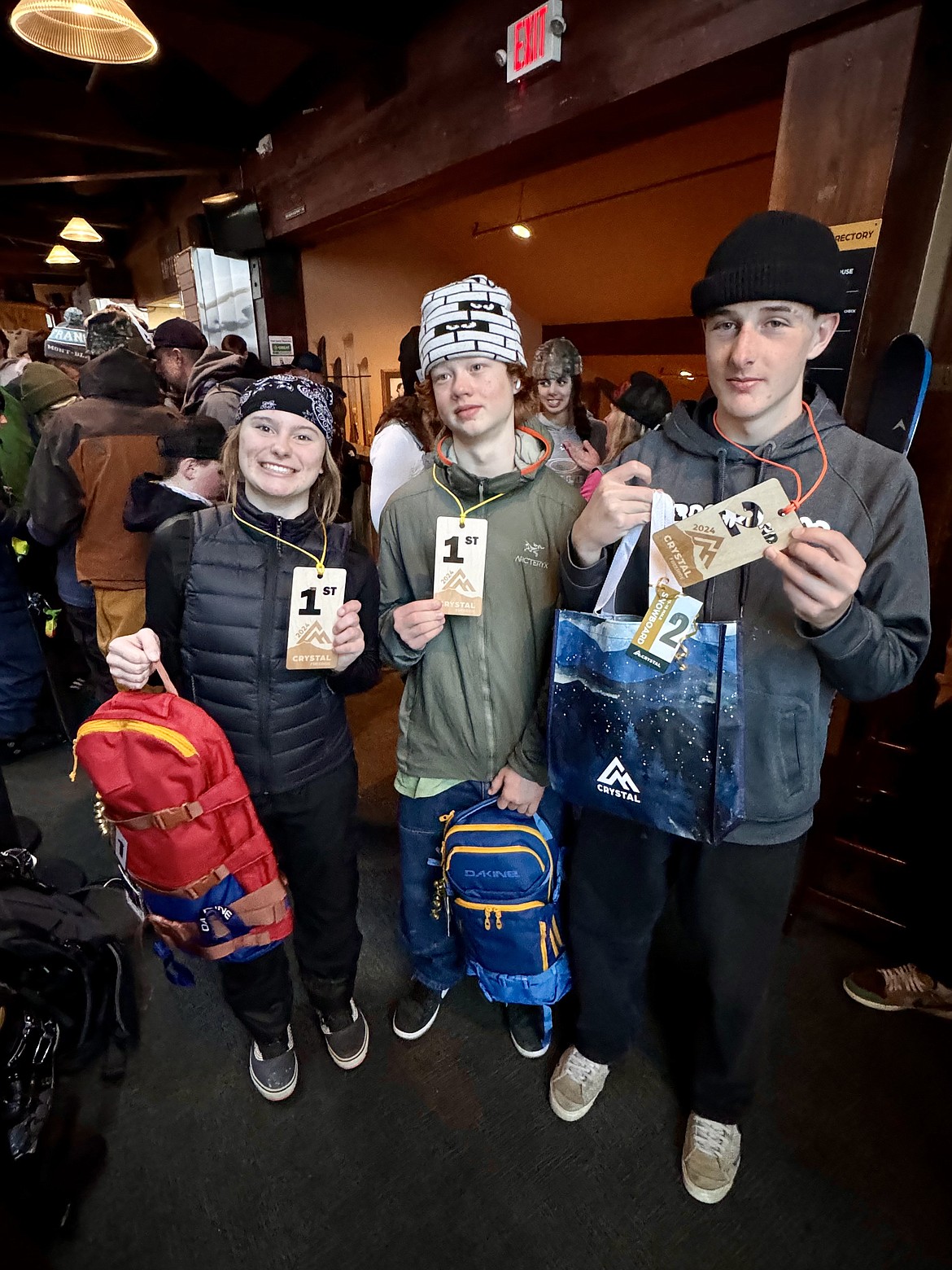 From left, Maddie Hall, Owen Miller and Max Taylor show off their awards after placing in their respective age divisions at Crystal Mountain Resort's freeriding competition last week.