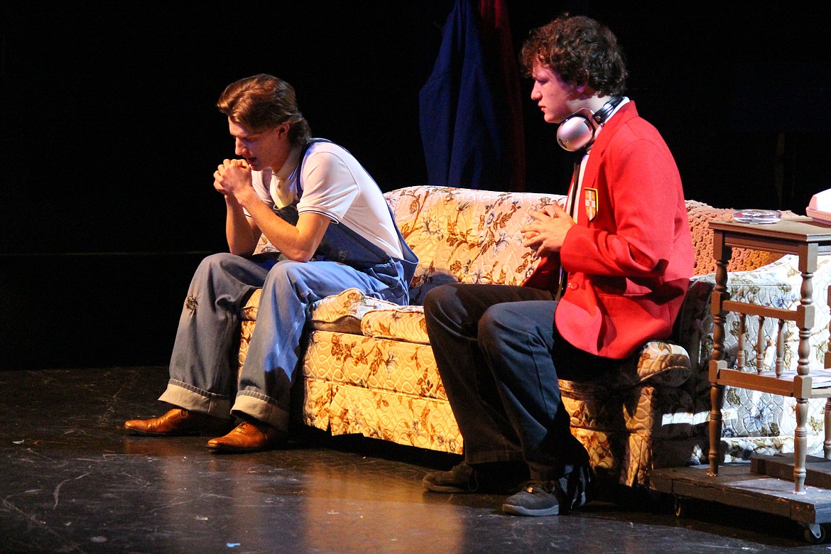 Christopher (Noah Carlile), right, hears some very bad news from his dad (Beck Ashton), left, in the Moses Lake High School production of “The Curious Incident of the Dog in the Night-time,” opening March 1.