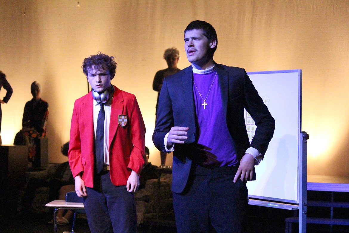 Christopher (Noah Carlile) wants some answers from the pastor (Andrew Rowley).