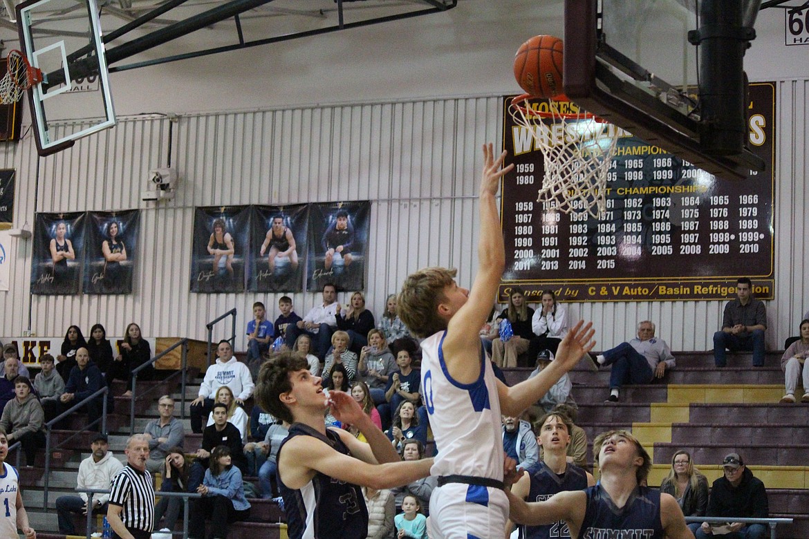 Soap Lake’s Ruvim Goloborodko (0) puts up the shot in Friday’s state tournament game.