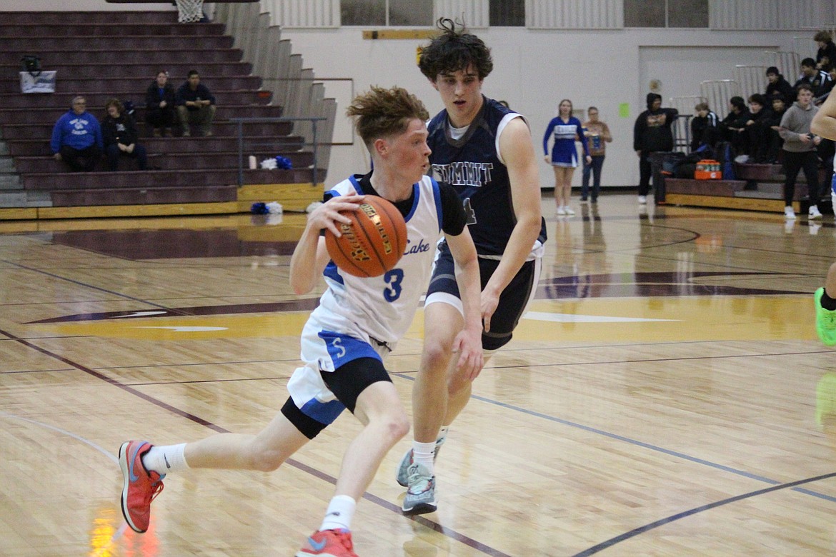 Soap Lake’s Trey Landdeck (3) evades a Summit defender.