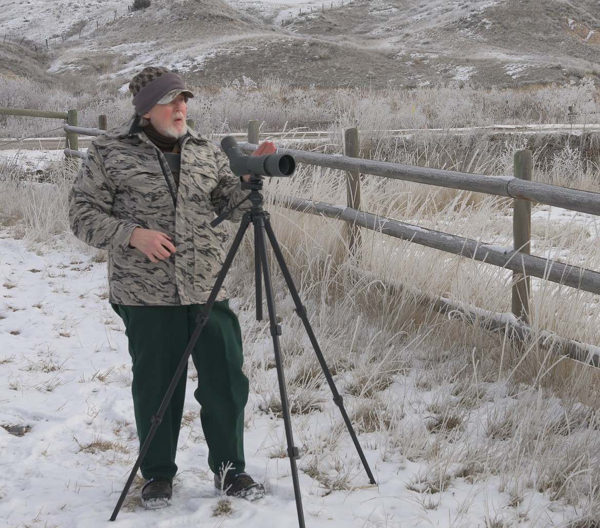 Wildlife biologist Brian Baxter locates bald eagles on a recent tour around Northwest Montana. (Tracy Scott/Valley Press)