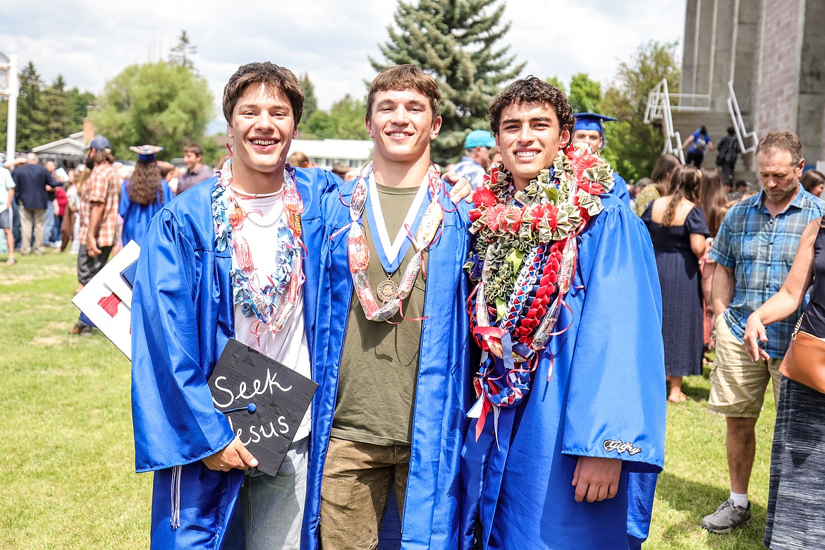 Josiah Kilman, Justin Windauer and Tyler Gilfry at their high school graduation in 2023. (JP Edge photo)