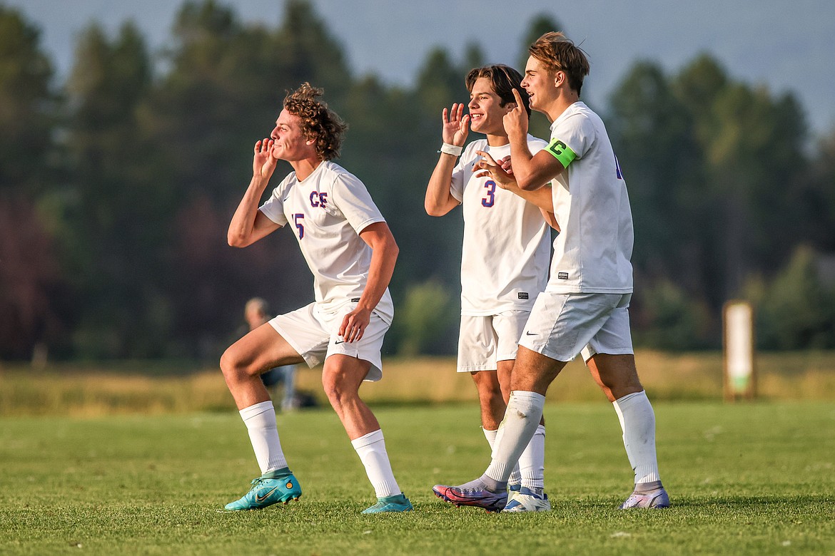 Adam Schader, Hosiah Kilman and Kai Golan celebrate after Golan's second goal with 4 minutes left of play in 2022. (JP Edge photo)