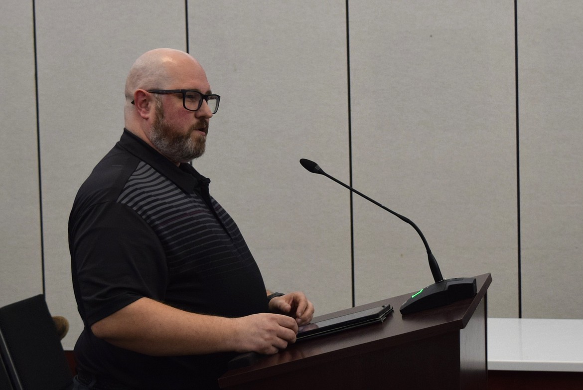 Othello Food Bank Board Chair Adam Janes addresses the Othello City Council during Monday evening’s regular meeting with an update on the food bank’s operations and finances.