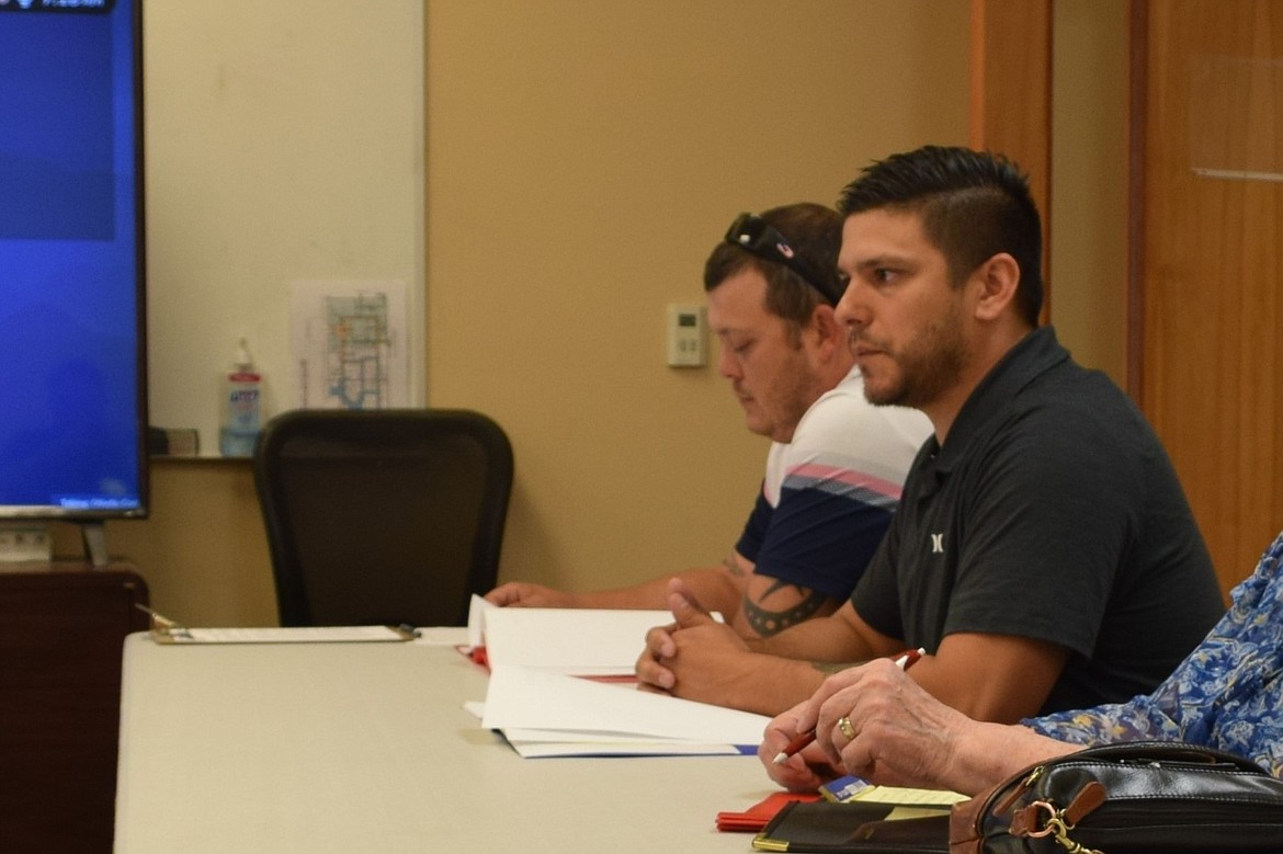 Othello Food Bank Manager Jose Garza, right, participates in a workshop in June 2023 with the Adams County Board of Commissioners to request funds and assistance acquiring equipment for the food bank.