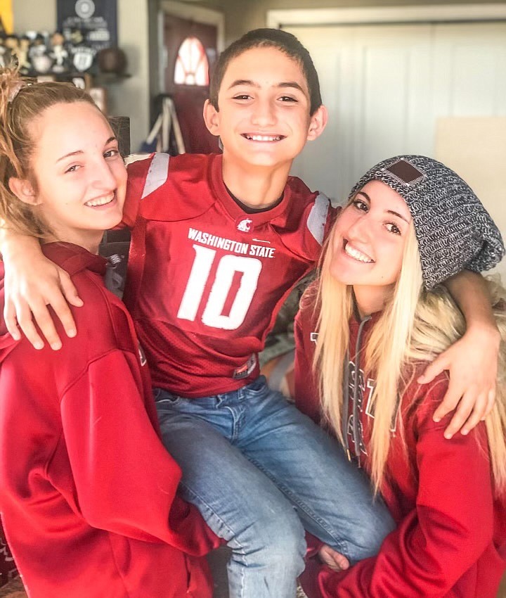 Jett Johnson, center, was a typical little brother in many ways to sisters Jayd, left, and Kaidyn Noga, right. He often attended their softball games and Kaidyn’s husband Riley and Jett have always been very close.