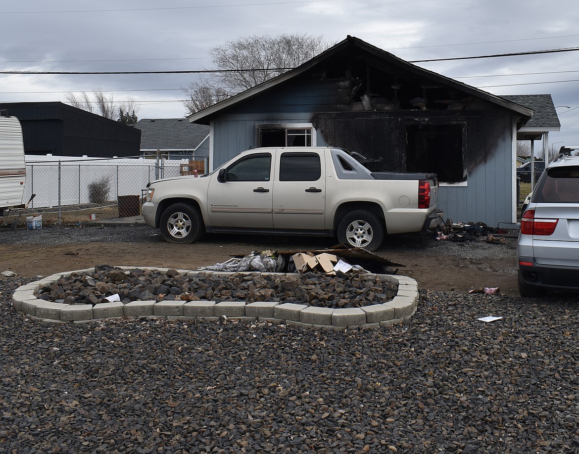 A house in Moses Lake burned twice Tuesday night.