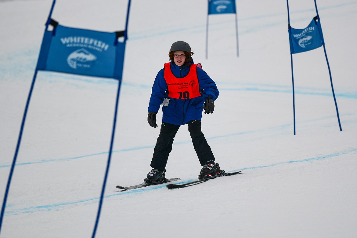 Zolana Sizemore-Wobschall, with the West Valley Warriors team, weaves between gates in the Alpine Slalom event during the Special Olympics Montana Glacier Area Winter Games at Whitefish Mountain Resort on Thursday, Feb. 29. (Casey Kreider/Daily Inter Lake)