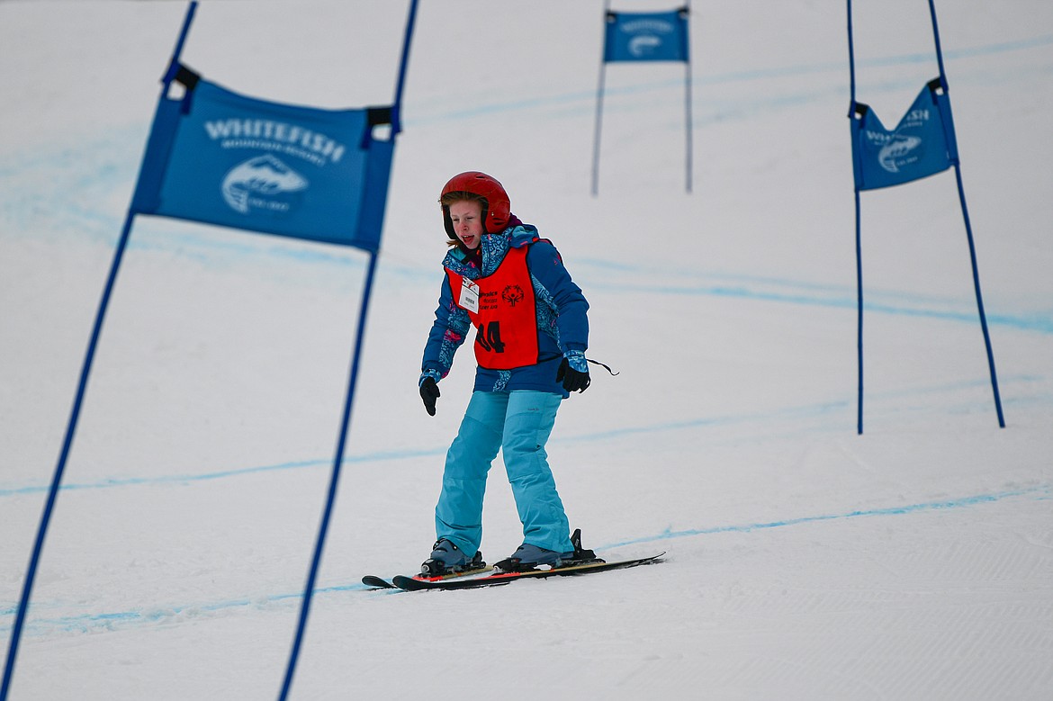 Alivia Westphal, with the Kalispell Public Schools team, weaves between gates in the Alpine Slalom event during the Special Olympics Montana Glacier Area Winter Games at Whitefish Mountain Resort on Thursday, Feb. 29. (Casey Kreider/Daily Inter Lake)