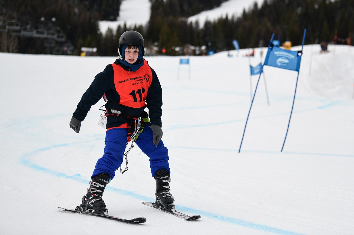 Noah Fisk, with the Kalispell Public Schools team, weaves between gates in the Alpine Slalom event during the Special Olympics Montana Glacier Area Winter Games at Whitefish Mountain Resort on Thursday, Feb. 29. (Casey Kreider/Daily Inter Lake)