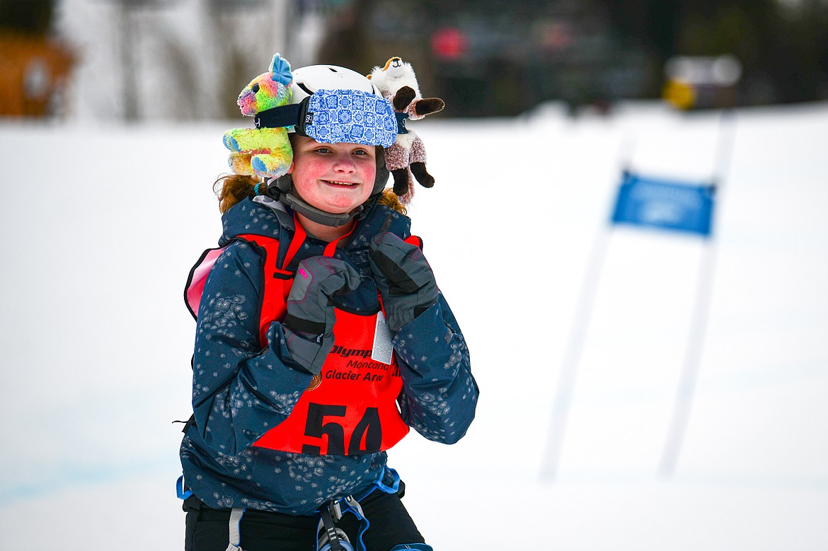 Audrey VanOstrand, with the Columbia Falls Wildcats team, smiles as she nears the finish line in the Alpine Slalom event during the Special Olympics Montana Glacier Area Winter Games at Whitefish Mountain Resort on Thursday, Feb. 29. (Casey Kreider/Daily Inter Lake)