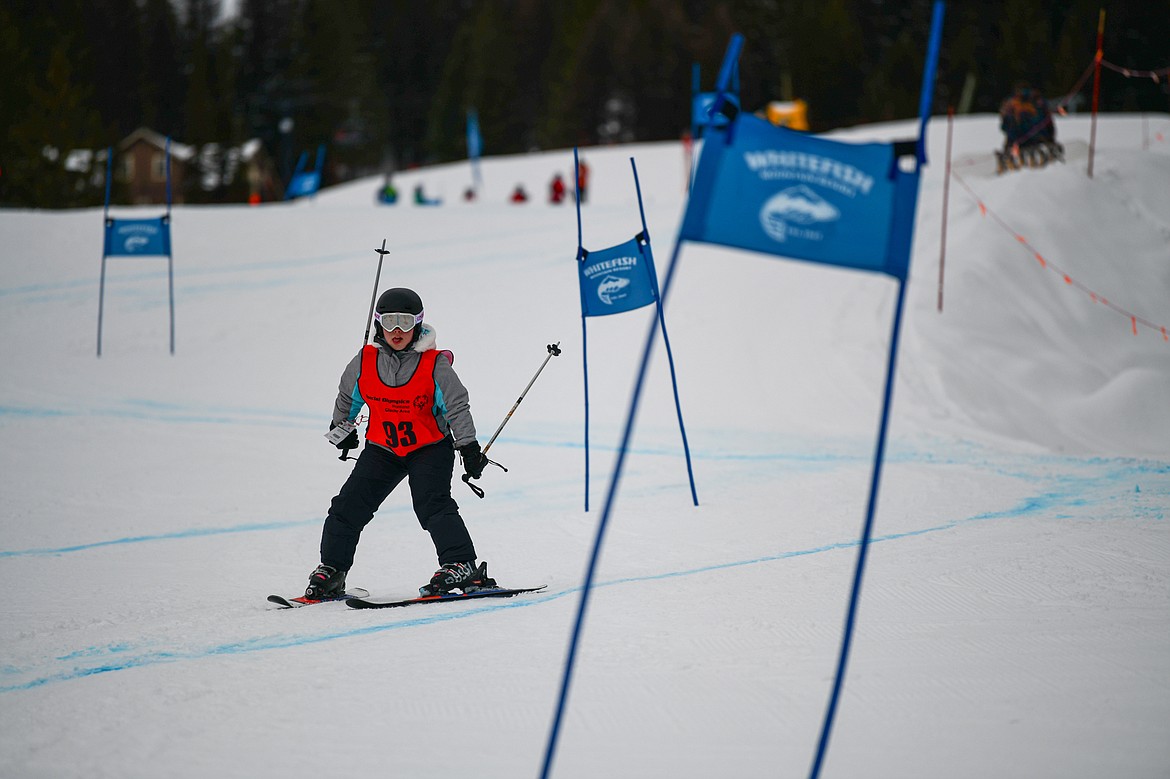 Mindy Whitmore, with the Whitefish Thunder team, weaves between gates in the Alpine Slalom event during the Special Olympics Montana Glacier Area Winter Games at Whitefish Mountain Resort on Thursday, Feb. 29. (Casey Kreider/Daily Inter Lake)