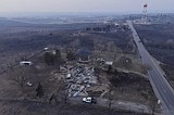 A wildfire scorching the Texas Panhandle has grown to the largest in state history