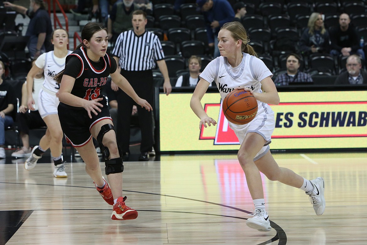 ACH sophomore Naomi Molitor, right, moves toward the rim in the first half against Garfield-Palouse.