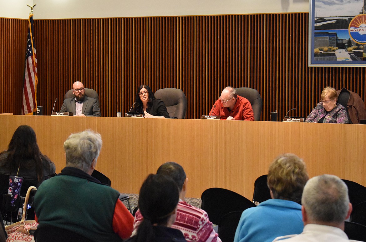 The Moses Lake City Council, including, from left, Council Members Don Myers, Deanna Martinez and Mark Fancher and Deputy Mayor Judy Madewell, voted Feb. 26 to approve a new water rate schedule, including extra fees for heavy water users.